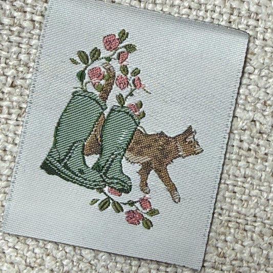 Acufactum Label - Boots and Cat