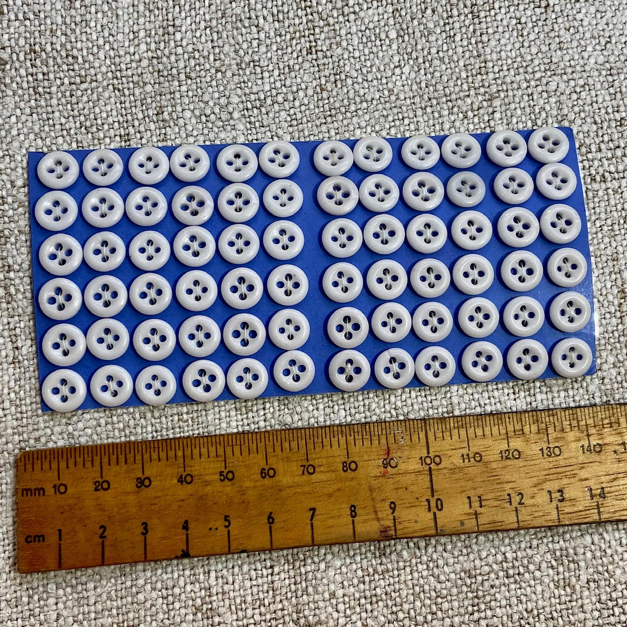 White Milk Glass Buttons - Item 23576